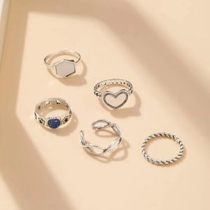 New NWT 5 piece ring set very cute- infinity design, blue with star cutouts,…